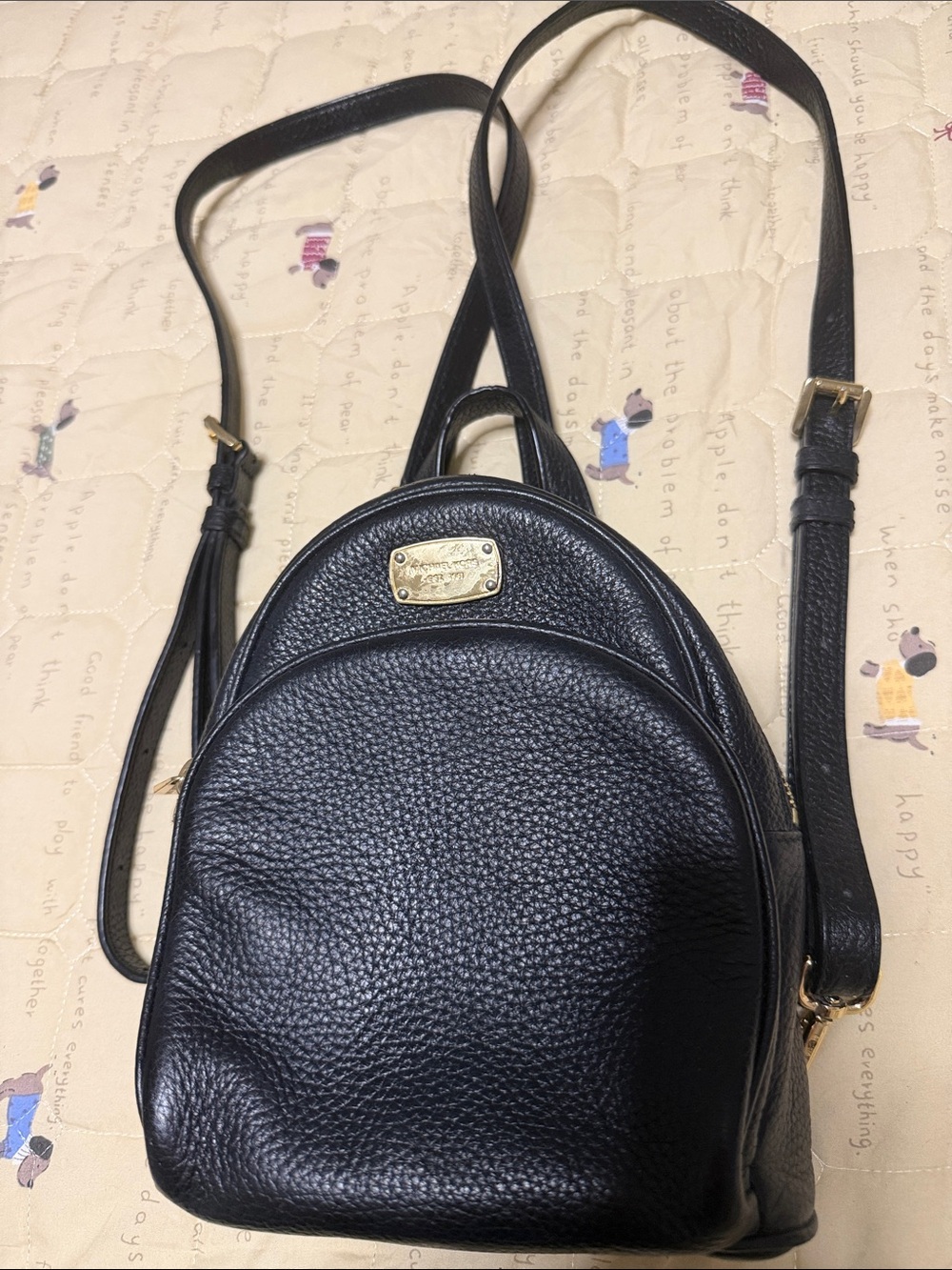 Michael Kors Black Pebbled Leather Mini Backpack with Gold Plaque
